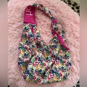 Justice Sport Graffiti Love Yourself adjustable sling carrier purse crossbody